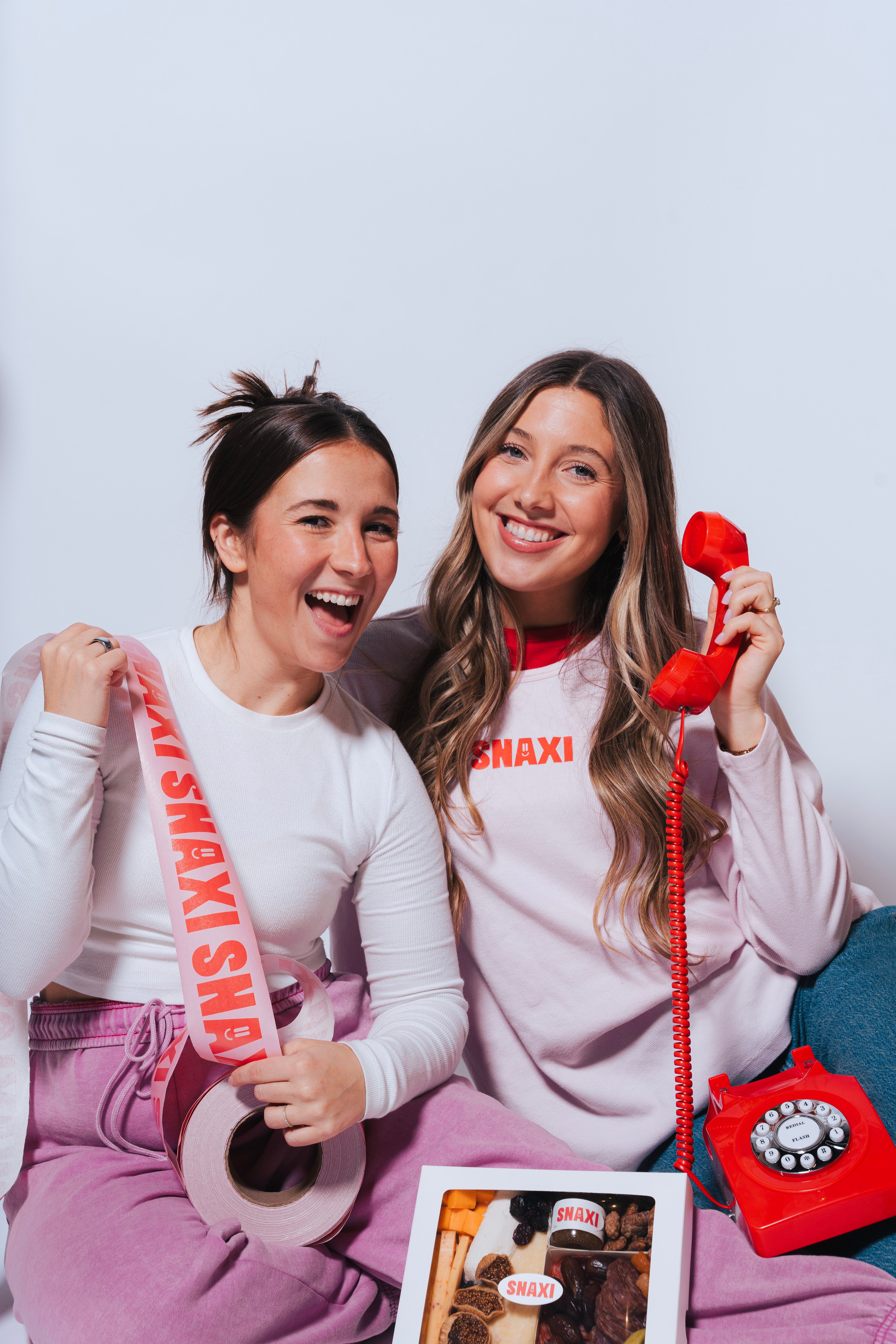 Hands preparing snack board